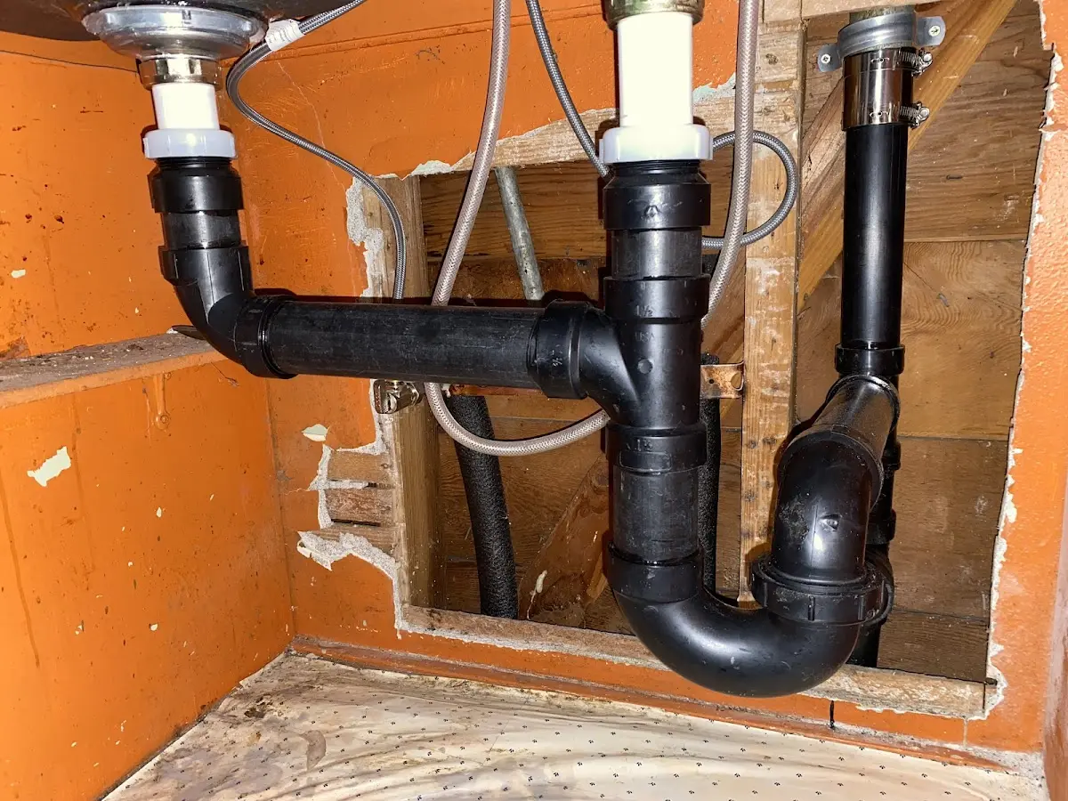 Professional Garbage Disposal Repair equipment and tools on the job in Myrtle Grove